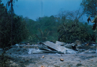 JSS armed members burn down houses at Bengi Chara, Longudu, Rangamati, 24 April 2001